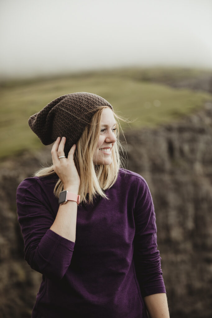 Faroe Islands Elopement Photographer on the edge of a cliff.