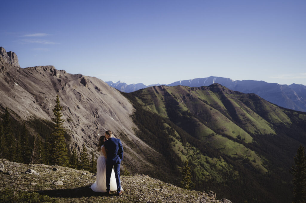 Mountaintop elopement hike in Sheep River Park, Canmore Photographer