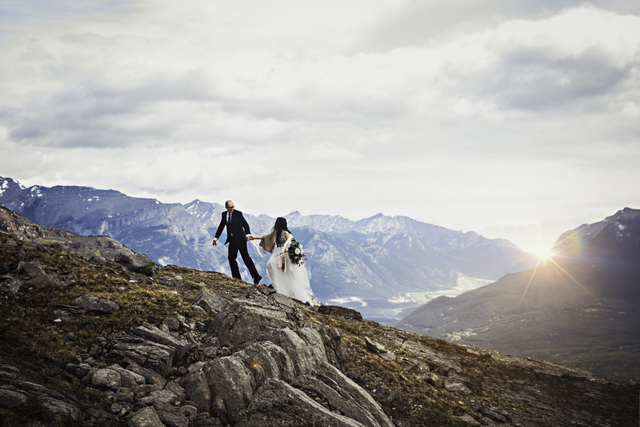 Couple eloping on top of a mountain in the Alberta rocky mountains.